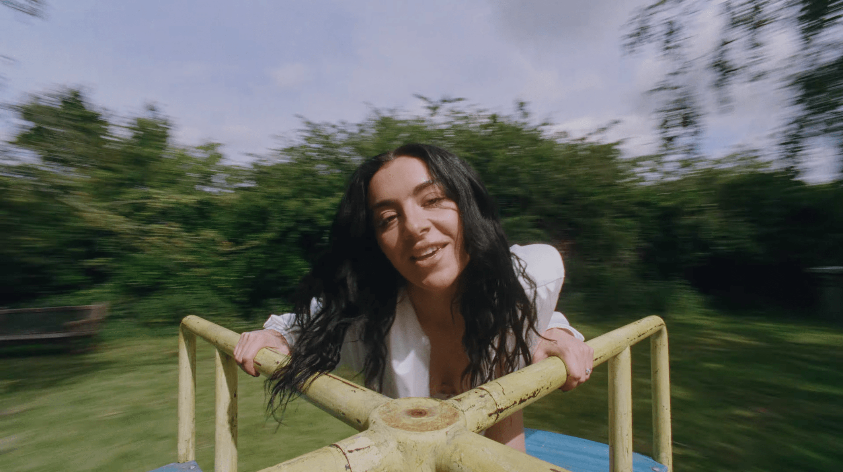 Source-feed image associated with Watch Charli XCX Let Loose in Video for New Song “Wink Wink”