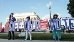 Source-feed image associated with Watch: Marchers reflect on voting rights 63 years after 'I have a dream' speech
