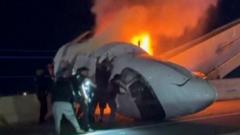 Source-feed image associated with Bystanders rush to rescue aircraft passengers after fiery Texas crash