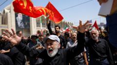 Source-feed image associated with Large crowds gather in Tehran on first day of Ayatollah Khamenei's funeral