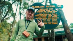 Source-feed image associated with How rapper Aitch's sister inspired him to climb one of the world's toughest peaks