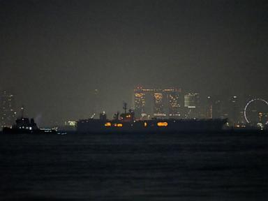 Source-feed image associated with USS Abraham Lincoln sails past Singapore on its way home from Middle East