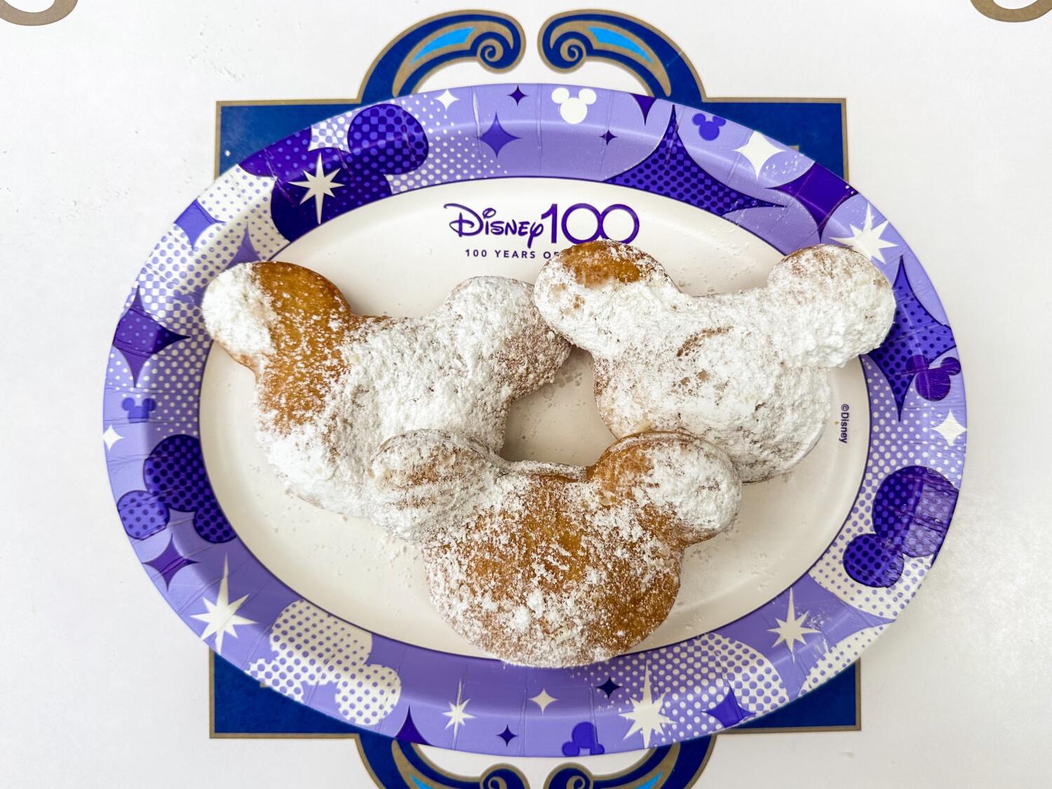 Source-feed image associated with 15% more for a Mickey beignet? Sticker shock hits Disneyland customers over food price increases