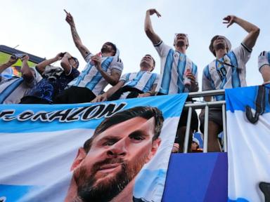 Source-feed image associated with Argentina is defending its World Cup title, and its fans are more obsessed than ever