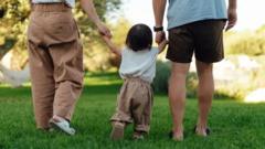 Source-feed image associated with It was 'love at first sight' with their adopted baby. Then they were told he may have been trafficked