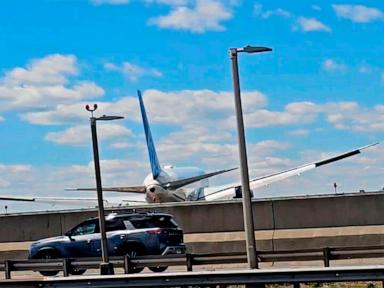 Source-feed image associated with Copilot of United jet that struck a light pole realized flight was low, but not in time: report