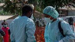 Source-feed image associated with Search for six-year-old Ebola patient after armed men storm DR Congo hospital