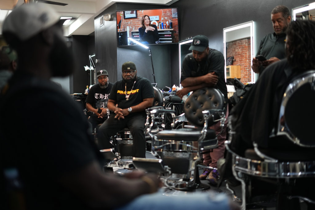 Source-feed image associated with Inside a Philadelphia barbershop, Black men debate their political past and future