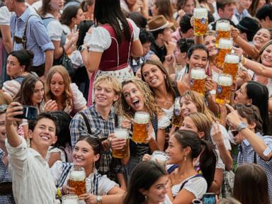 Source-feed image associated with Munich's Oktoberfest roars to life as the mayor taps the first keg