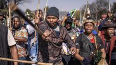 Source-feed image associated with South Africa says more than 53,000 foreigners deported in migration campaign