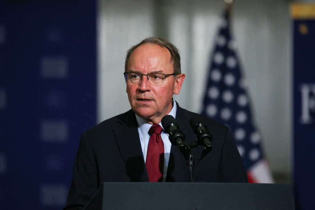 Source-feed image associated with Rep. Tom Tiffany swims to safety after plane makes emergency landing in a Wisconsin lake