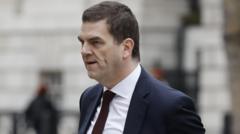 Source-feed image associated with Former top official Robbins takes legal action over sacking