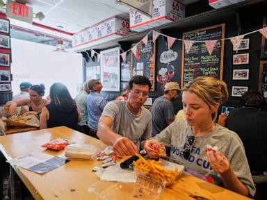 Source-feed image associated with From poutine to barbecue, local cuisines give World Cup fans another reason to cheer