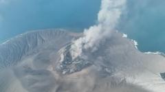Source-feed image associated with Indonesia volcano eruption leaves 270,000 stranded as airports extend closure