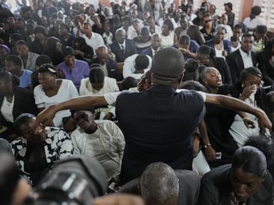 Source-feed image associated with Hundreds attend funeral in Haiti for 4 victims of brutal gang attack that killed 47
