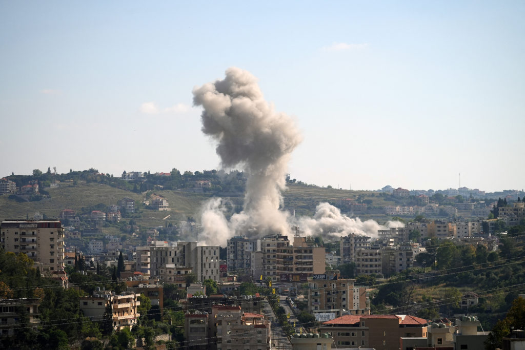Source-feed image associated with Trump says Israel and Hezbollah have agreed to dial back fighting after mediated talks