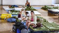 Source-feed image associated with Thousands evacuated in Crete as wildfires threaten tourist resorts