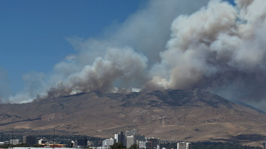 Source-feed image associated with Human-caused wildfire approaches Reno, Nevada, forcing thousands of evacuations