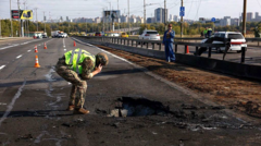 Image from linked report: Kyiv bridge hit in further Russian drone attack as German chancellor makes surprise visit