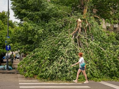 Source-feed image associated with 1 dead in Romania in a powerful storm after intense heatwave