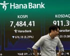 Source-feed image associated with Global stock markets fall as concerns persist over tech firms at heart of AI boom