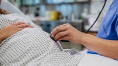 Source-feed image associated with Government promises to act on maternity care failings which 'shame our society'