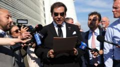 Source-feed image associated with Ex-congressman George Santos banned from betting platform for life