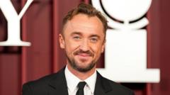 Source-feed image associated with Tom Felton: I'm so excited to see Rupert Grint play Ron Weasley again