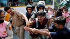 Image from linked report: 'Cockroach' group leaders among hundreds detained in Delhi protest