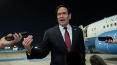 Source-feed image associated with UN says it will evacuate sailors stranded in Strait of Hormuz, as Rubio warns against tolls