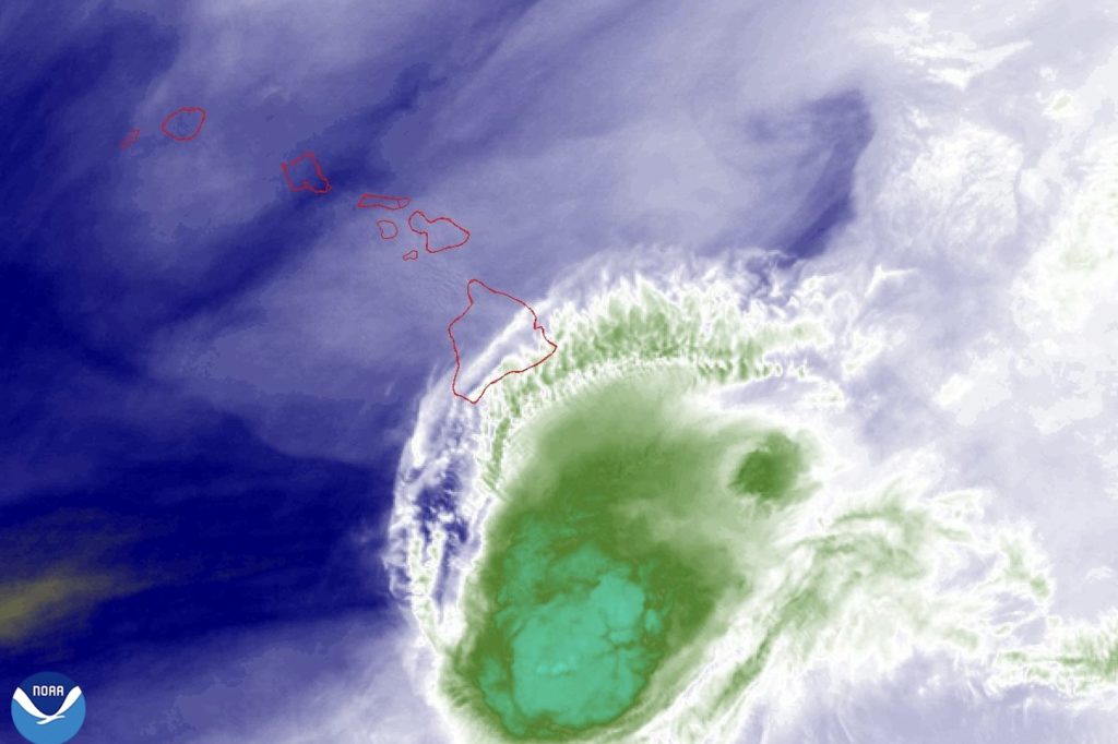 Source-feed image associated with Tropical Storm Moke dumps more rain on hurricane-stricken Hawaii