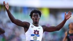 Source-feed image associated with US college athlete smashes 110m hurdles world record