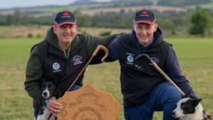 Image from linked report: Father and son crowned Sheep Dog World Trial champions