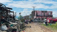 Source-feed image associated with Huge blast kills dozens in rebel-held village in Myanmar