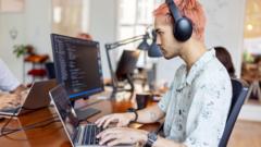 Source-feed image associated with Tech leaders say AI means less work - their staff say they work up to 90 hours a week