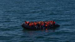 Source-feed image associated with Number of asylum seekers in hotels halves in a year