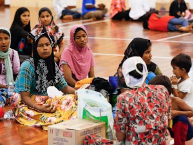 Source-feed image associated with Malaysia begins screening 5,000 refugees for their planned return to Myanmar