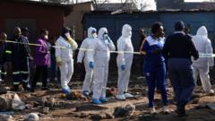 Source-feed image associated with Manhunt under way in South Africa after 12 killed in mass shooting in Johannesburg