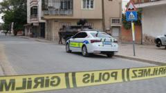 Image from linked report: Eleven injured in shooting outside Turkish school