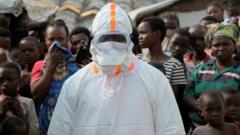 Source-feed image associated with UK humanitarian worker monitored for Ebola in London hospital