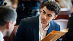 Source-feed image associated with Mangione's lawyers reverse course on psychiatric defence in state murder trial