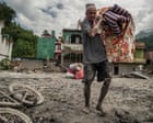 Source-feed image associated with Devastated by floods and overwhelmed by bodies, Nepalis weep for what remains of their homes