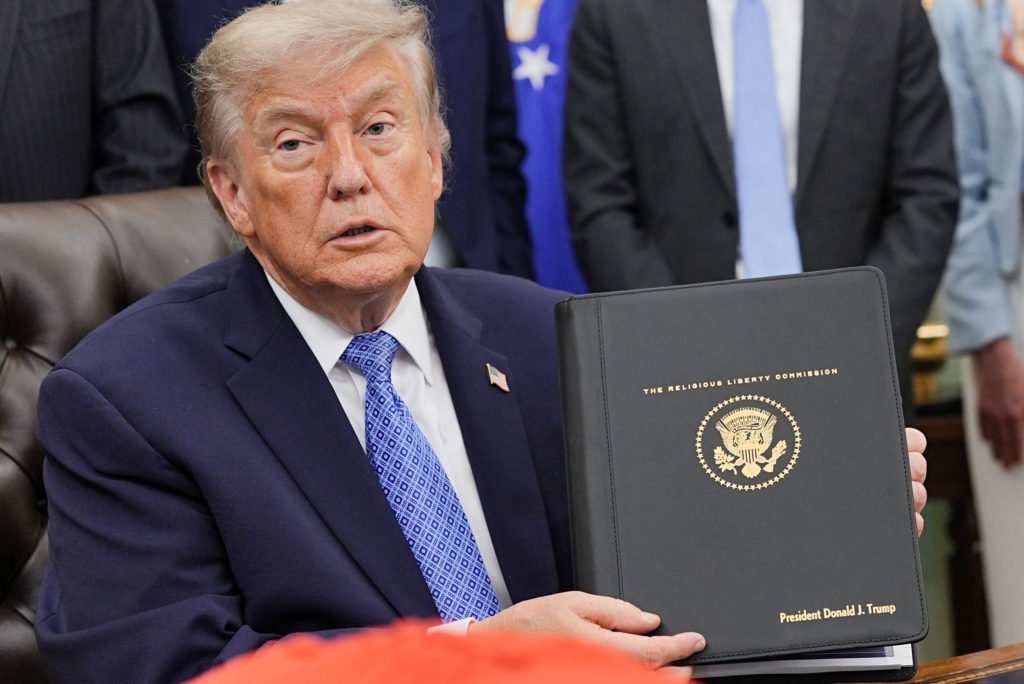 Source-feed image associated with WATCH: Trump receives report from Religious Liberty Commission in the Oval Office