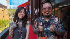 Source-feed image associated with After decades risking arrest, South Korea's tattoo artists step into the limelight