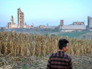 Source-feed image associated with Indonesians fight a German cement giant over a mine and factory project