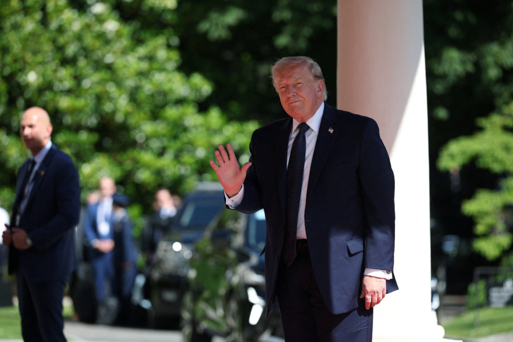 Source-feed image associated with WATCH: Trump joins official leaders' greeting at G7 summit in France