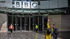 Source-feed image associated with BBC announces 550 job cuts as first part of £500m savings plan