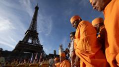 Source-feed image associated with Eiffel Tower shut by staff protest after female workers moved for religious visit