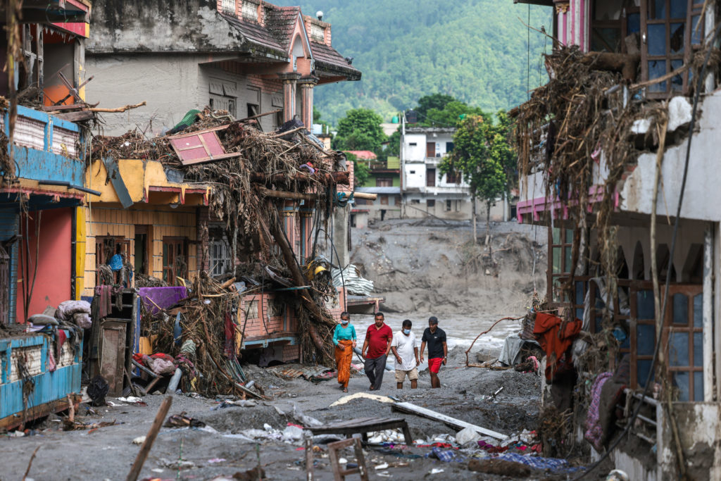 Source-feed image associated with Nepal warns of possible fresh flooding as communities grapple with devastation