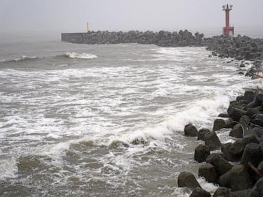 Source-feed image associated with 2 tropical storms pound Japan with floods and landslides, killing 1
